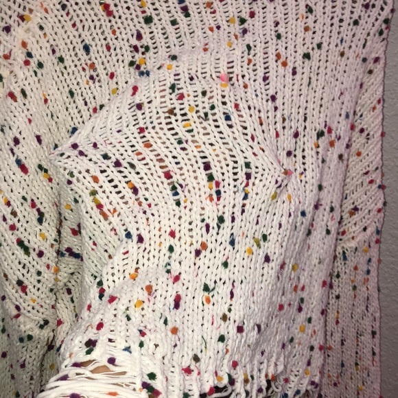 A cute colorful sweater with  a distressed bottom - Picture 6 of 6